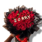 red rose hand bouquet