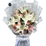 Premium fresh lily, pink rose, and baby breath hand bouquet