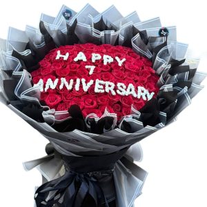 Anniversary bouquet in Dhaka with red flowers and Happy Anniversary message – Flower Gift BD